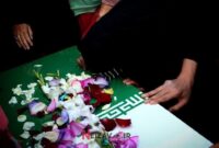 آیین معنوی همراه با قرائت زیارت عاشورا و حضور پیکر مطهر شهید گمنام