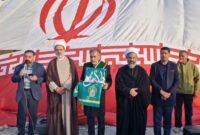 پرچم متبرک ضریح حضرت معصومه(س) در جوار یادمان شهدای درجزین به اهتزاز درآمد پرچم متبرک ضریح حضرت معصومه(س) در جوار یادمان شهدای درجزین به اهتزاز درآمد